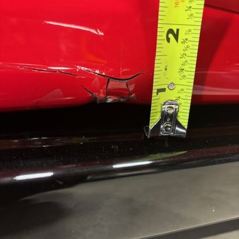 Prestige Auto Reconditioning - Before: damage to the lower driver side panel (with black side skirt in place) - Mobile Dent Repair Near Me