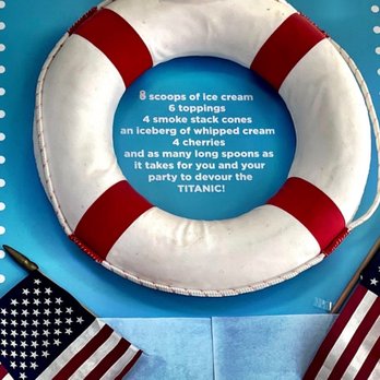 Justine's Ice Cream Parlour - a life preserver and american flags - Ice Cream & Frozen Yogurt Near Me - Saint Michaels, Maryland Justine's Ice Cream Parlour - a life preserver and american flags - Ice Cream & Frozen Yogurt Near Me - Saint Michaels, Maryland