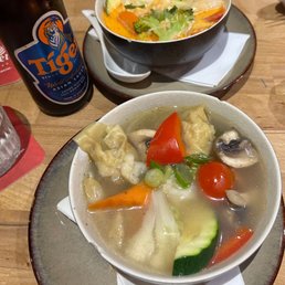 Wonton soup and Tom yum soup Wonton soup and Tom yum soup
