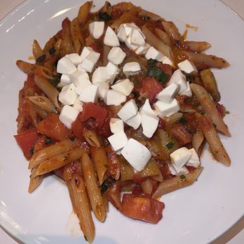 Ragazzi Italian Restaurant - Penne Alla Siciliana - penne pasta with diced eggplant and tomato in light tomato sauce topped with fresh bocconcini mozzarella cheese - Italian Near Me - Nesconset, New York Ragazzi Italian Restaurant - Penne Alla Siciliana - penne pasta with diced eggplant and tomato in light tomato sauce topped with fresh bocconcini mozzarella cheese - Italian Near Me - Nesconset, New York
