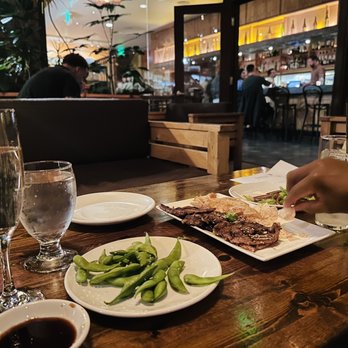 Umi Sake House - Complimentary Edamame & BBQ Pork Short Ribs with Ube Chips - Sushi Bars Near Me - Seattle, Washington Umi Sake House - Complimentary Edamame & BBQ Pork Short Ribs with Ube Chips - Sushi Bars Near Me - Seattle, Washington