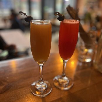 Twisted Fork - two glasses of beer on a table - French Near Me - Vancouver, British Columbia Twisted Fork - two glasses of beer on a table - French Near Me - Vancouver, British Columbia