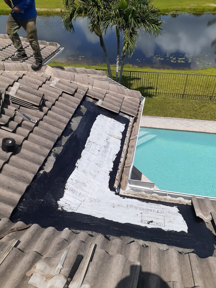 Slide of Louis Roofing