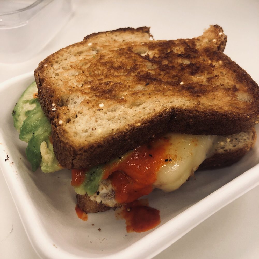 Little Beet - Avocado, egg, and cheese sandwich - took a bite before I took the picture bc I couldn't wait! - Gluten-Free Near Me - New York, New York