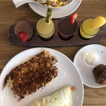 Broken Yolk Cafe - Country skillet; Mimosa flight; Greek omelette - Breakfast & Brunch Near Me - Costa Mesa, California Broken Yolk Cafe - Country skillet; Mimosa flight; Greek omelette - Breakfast & Brunch Near Me - Costa Mesa, California