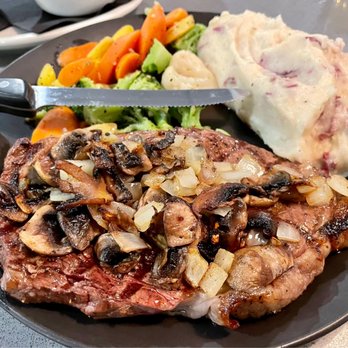 Duke’s Grille - Ribeye steak with added mushrooms and onions. Delicious! - American Near Me - Twin Falls, Idaho Duke’s Grille - Ribeye steak with added mushrooms and onions. Delicious! - American Near Me - Twin Falls, Idaho