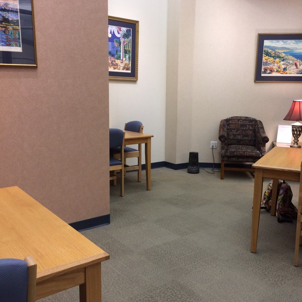 "Quiet" room in the front where no talking is allowed. It's kind of small with three tables "Quiet" room in the front where no talking is allowed. It's kind of small with three tables