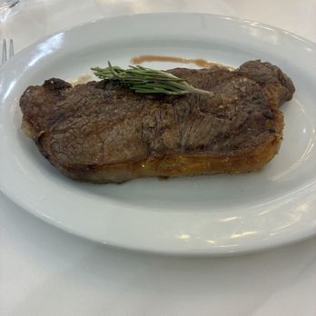 Empire Steak House - New York steak cooked to perfection and seasoned so well. - Steakhouses Near Me - Honolulu, Hawaii