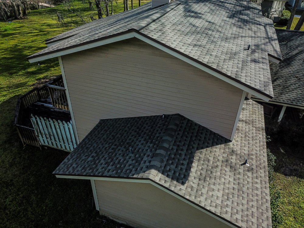 Slide of Action Roofing