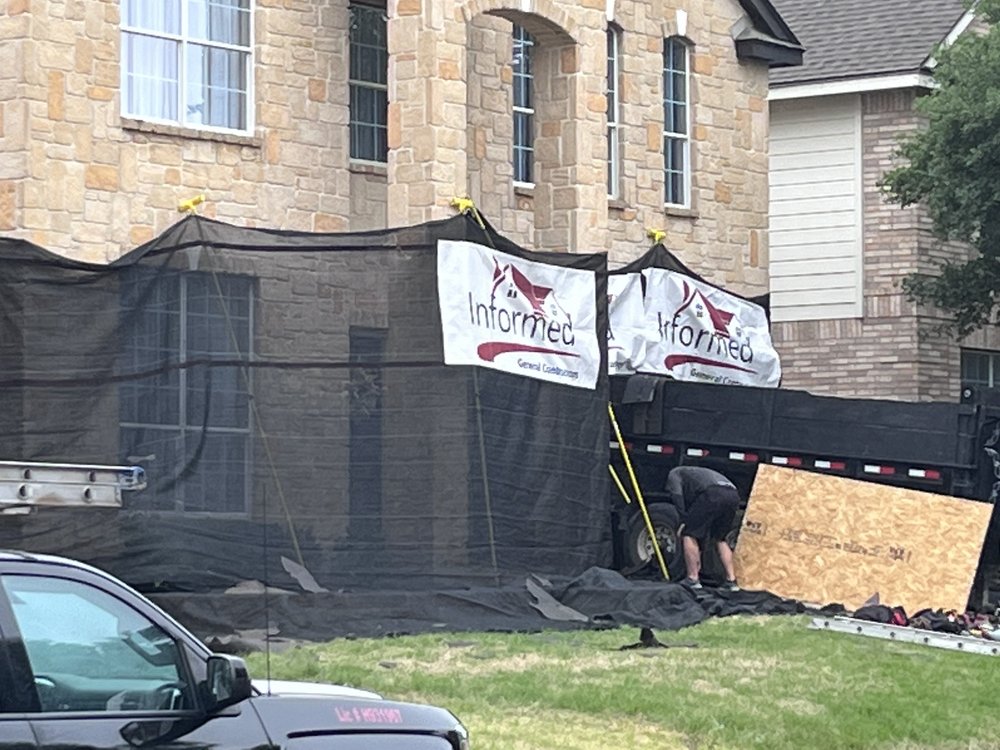 Slide of Informed Roofing & Restoration