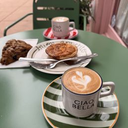 Cappucinos, quiche, and a blueberry scone Cappucinos, quiche, and a blueberry scone