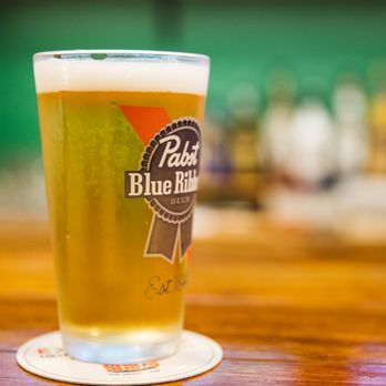 Sanford Otb - a pint of beer on a table - Sports Bars Near Me - Sanford, Maine Sanford Otb - a pint of beer on a table - Sports Bars Near Me - Sanford, Maine
