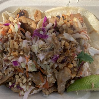 Earth Aloha Eats - Thai chicken tacos with a slightly sweet but very savory peanut sauce. - Food Trucks Near Me - Honolulu, Hawaii Earth Aloha Eats - Thai chicken tacos with a slightly sweet but very savory peanut sauce. - Food Trucks Near Me - Honolulu, Hawaii