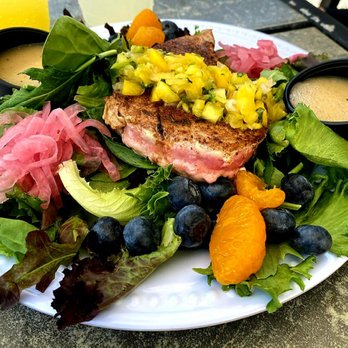 185 - Seared fish on greens with pickled onions and berries - American Near Me - Poquoson, Virginia 185 - Seared fish on greens with pickled onions and berries - American Near Me - Poquoson, Virginia