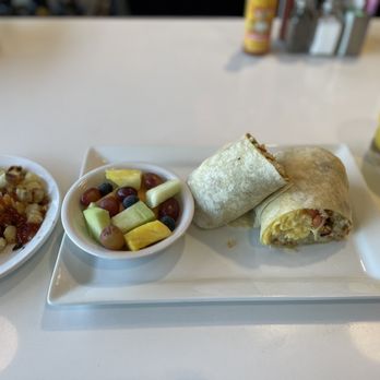 Over Easy - Surprise - Fresh squeezed OJ, Breakfast burrito with a side order of potatoes O'Brien - Breakfast & Brunch Near Me - Surprise, Arizona Over Easy - Surprise - Fresh squeezed OJ, Breakfast burrito with a side order of potatoes O'Brien - Breakfast & Brunch Near Me - Surprise, Arizona