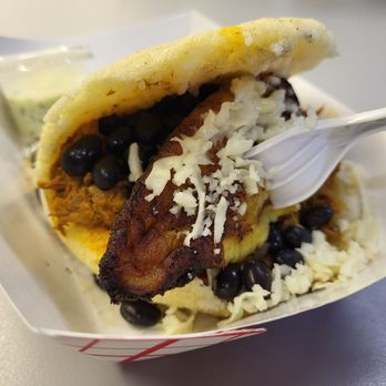El Venezolano - Shredded beef, black bean, plantain arepa - Venezuelan Near Me - Indianapolis, Indiana