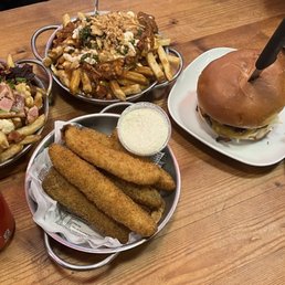 The baked potato poutine, the cowboy poutine, deep fried pickles, the effin good burger and another baked potato poutine. The baked potato poutine, the cowboy poutine, deep fried pickles, the effin good burger and another baked potato poutine.