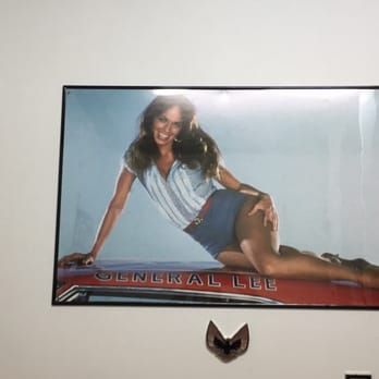 CorkScrew BBQ - Catherine Bach of Dukes of Hazard smiles at you in the men's restroom - Barbeque Near Me - Spring, Texas