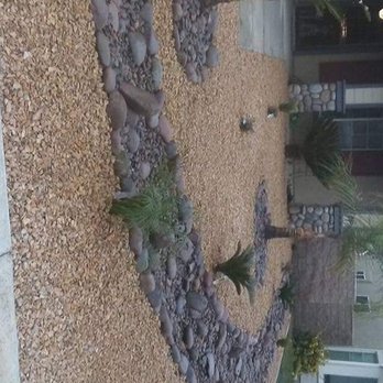 Victor Landscaping - the front yard of a home - Landscaping Near Me Victor Landscaping - the front yard of a home - Landscaping Near Me