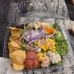Medium poke plate with shrimp, scallops and spicy tuna! So delicious and fresh! Half chips and half salad! So good!!!
