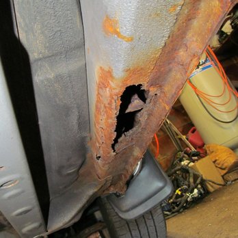 Marty's Auto Sales - Rust on thr Right unibody frame - Car Dealers Near Me - Savage, Minnesota Marty's Auto Sales - Rust on thr Right unibody frame - Car Dealers Near Me - Savage, Minnesota