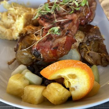 Oreatha's at The Point - Juicy pork chop with potatoes and eggs - Cocktail Bars Near Me - Atlanta, Georgia Oreatha's at The Point - Juicy pork chop with potatoes and eggs - Cocktail Bars Near Me - Atlanta, Georgia