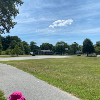 Pine Forest Park - Basketball court, one hoop, concrete has grass growing through it. - Parks Near Me - Greenville, South Carolina Pine Forest Park - Basketball court, one hoop, concrete has grass growing through it. - Parks Near Me - Greenville, South Carolina