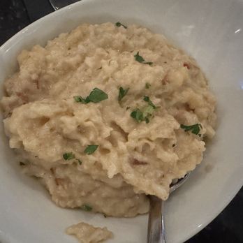Alder & Birch - White cheddar Tasso grits - Steakhouses Near Me - Kenner, Louisiana