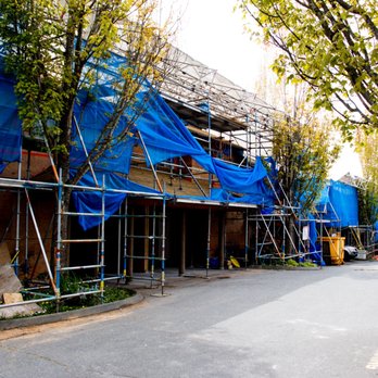 Pentagon Construction - scaffolding covering a building - General Contractors Near Me Pentagon Construction - scaffolding covering a building - General Contractors Near Me