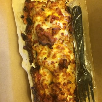 Domino's Pizza - a pizza in a box with a fork and knife - Pizza Near Me - Evanston, Wyoming Domino's Pizza - a pizza in a box with a fork and knife - Pizza Near Me - Evanston, Wyoming