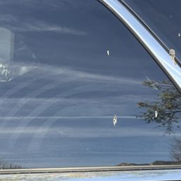 Side window with bird poop. Side window with bird poop.