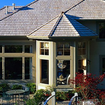 Construction Concern - a house with a clock tower in the background - General Contractors Near Me - Newhall, California