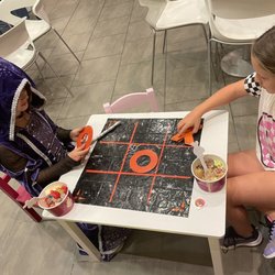 Menchie's - Playing tiktaktoe