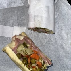 Orleans & York Deli Carson - The OG Orleans Muffuletta. One sign of authenticity is that it's not toasted.