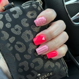 Colored acrylic with design over my natural nails Colored acrylic with design over my natural nails