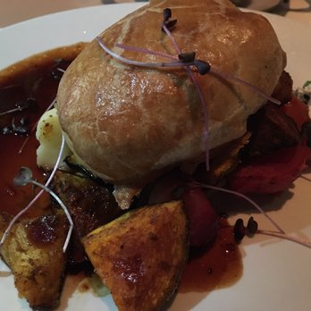 Black+Blue Vancouver - Beef Wellington in red wine sauce with root vegetables - Steakhouses Near Me - Vancouver, British Columbia