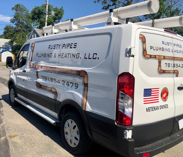 Slide of Rusty Pipes Plumbing & Heating