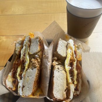 The Grind - Bacon and egg bagel with vegan cheddar - Coffee & Tea Near Me - Morgantown, West Virginia The Grind - Bacon and egg bagel with vegan cheddar - Coffee & Tea Near Me - Morgantown, West Virginia