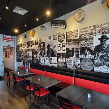 Burgers@ Apollo - Ample seating + DMV culture wallpaper - Burgers Near Me - Camp Springs, Maryland