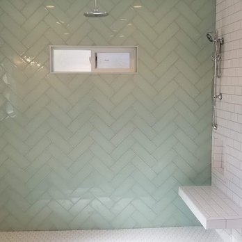 Cornerstone Builders - Master Bath AFTER: multiple showerheads, massive tile walk-in shower, free floated bench, new window - General Contractors Near Me - Redwood City, California