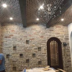 Martinez Masonry - Kitchen wall leading to wine room. Barreled brick ceiling.