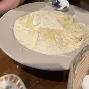 Belluccis Italian - Tortellini Alfredo with added Parmesan and my son added the remainder of Alfredo dipping sauce on top too - Italian Near Me - Midlothian, Texas