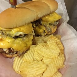 HoggPen Bar & Grill - KJ's ultimate 2 lb burger - 4 1/2lb pattys served with American & Swiss cheese topped with sautéed onions and mushrooms