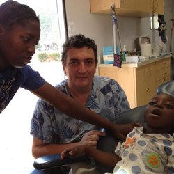 Hudson Valley Dental Care - Dr. T travels abroad to offer dentistry to many patients across the world. Above he is in Zambia!