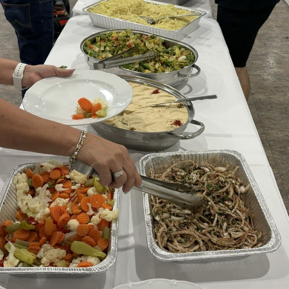 Raffi's Catering and Banquet - Trays of veggies, seasoned grilled onions, humus, cold salad with lettuce cucumbers tomatoes and rice - Middle Eastern Near Me - Pasadena, California Raffi's Catering and Banquet - Trays of veggies, seasoned grilled onions, humus, cold salad with lettuce cucumbers tomatoes and rice - Middle Eastern Near Me - Pasadena, California