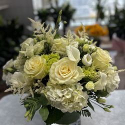International Florist - All white leaf lined vase arrangment centerpiece