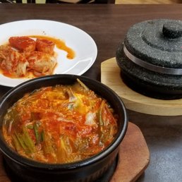 Spicy beef soup with rice in hot stone bowl....so so delicious!