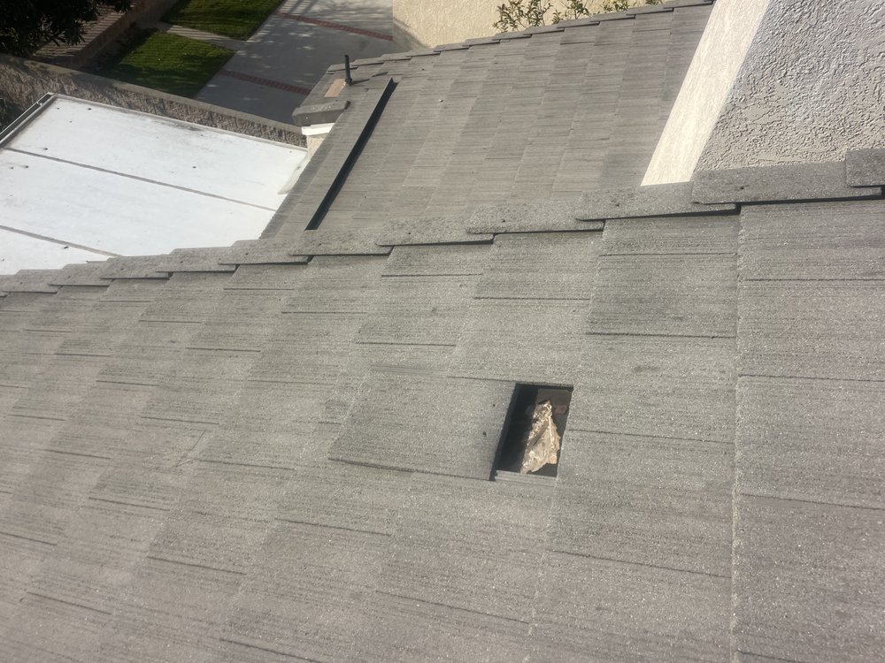 Slide of A Town Roofing