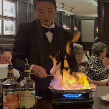 Hy's Steak House - Grace working her fiery magic! - Steakhouses Near Me - Honolulu, Hawaii