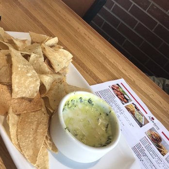Applebee's Grill + Bar - Spinach and Artichoke Dip Don't expect to split with the table... or even one other person. - American Near Me - Monroe, Louisiana